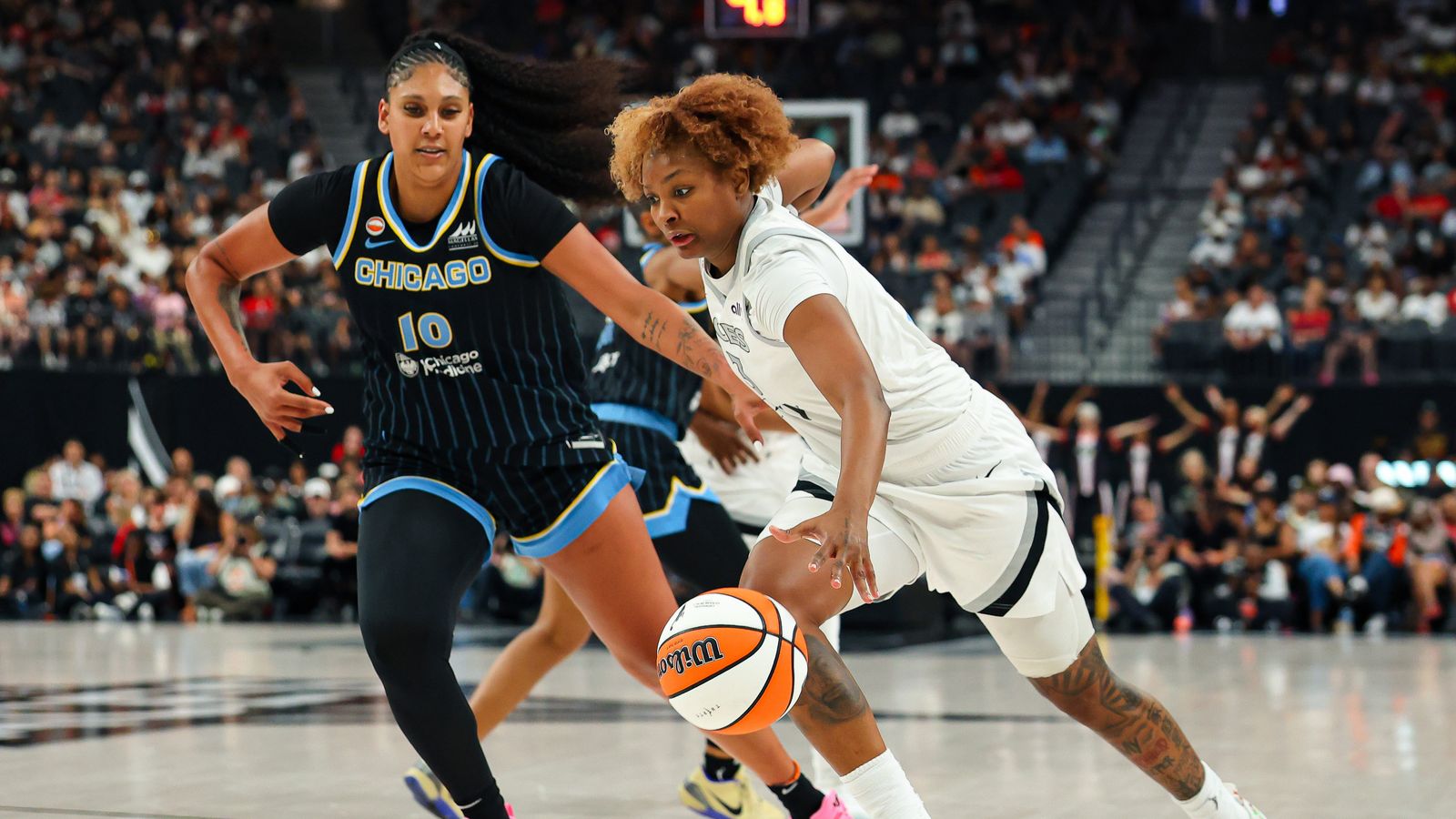 Nalyssa Smith drives to the basket in a WNBA game.