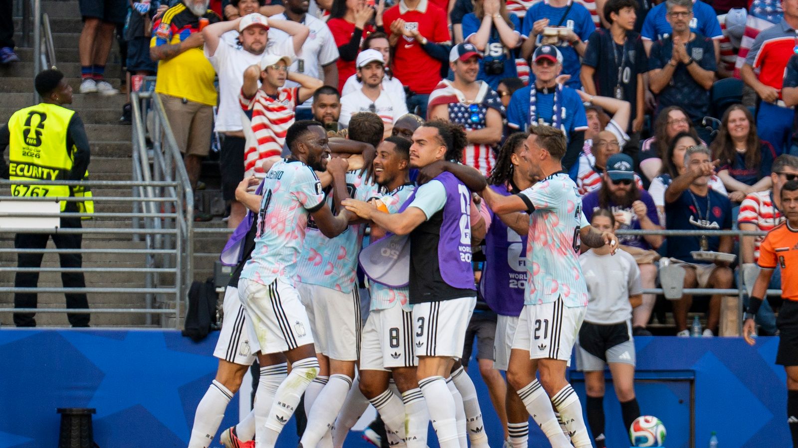 Belgium team celebrates a goal in the World Cup match against the US.