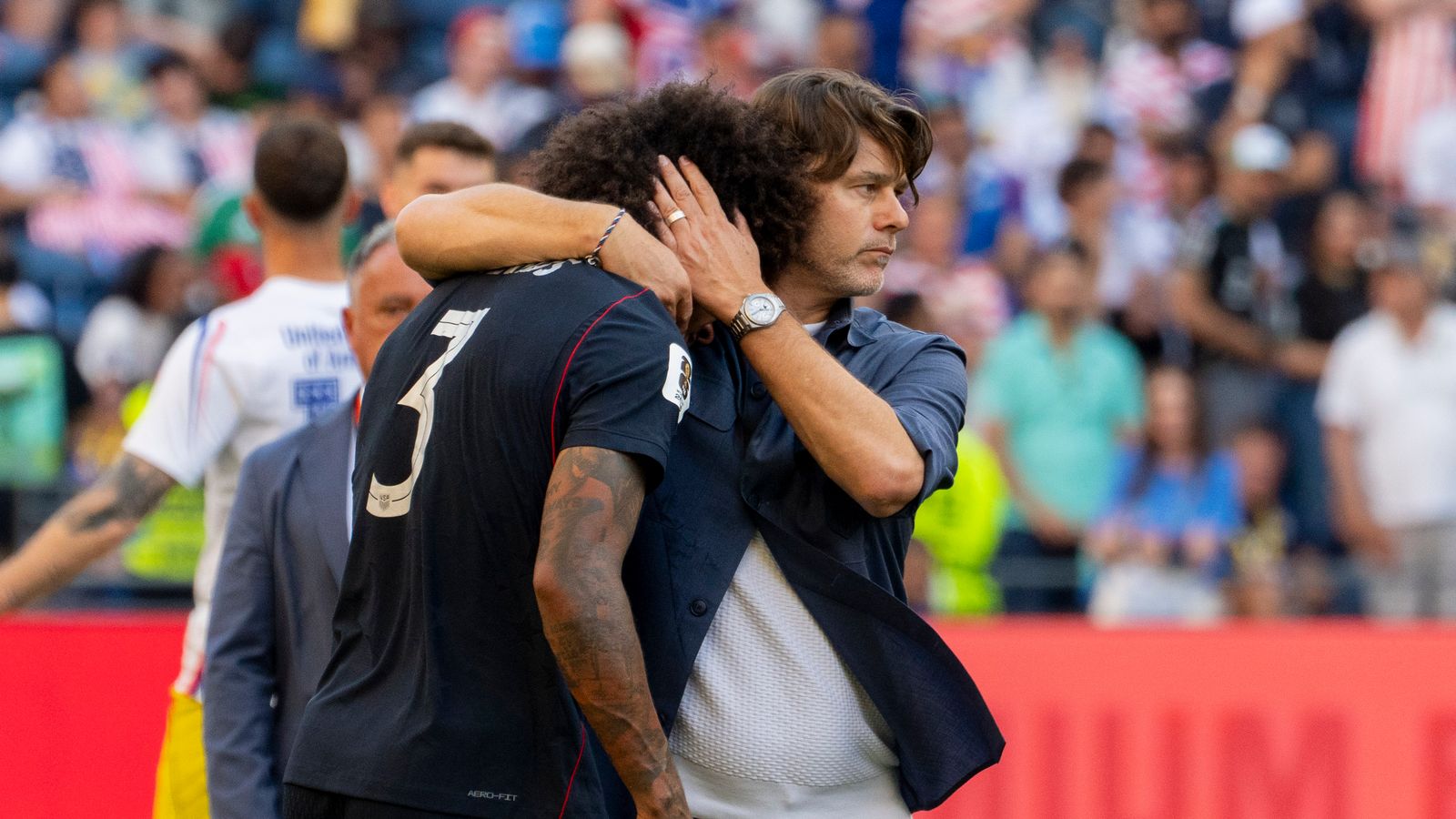 Chris Richards and coach Pochettino post-match against Belgium.