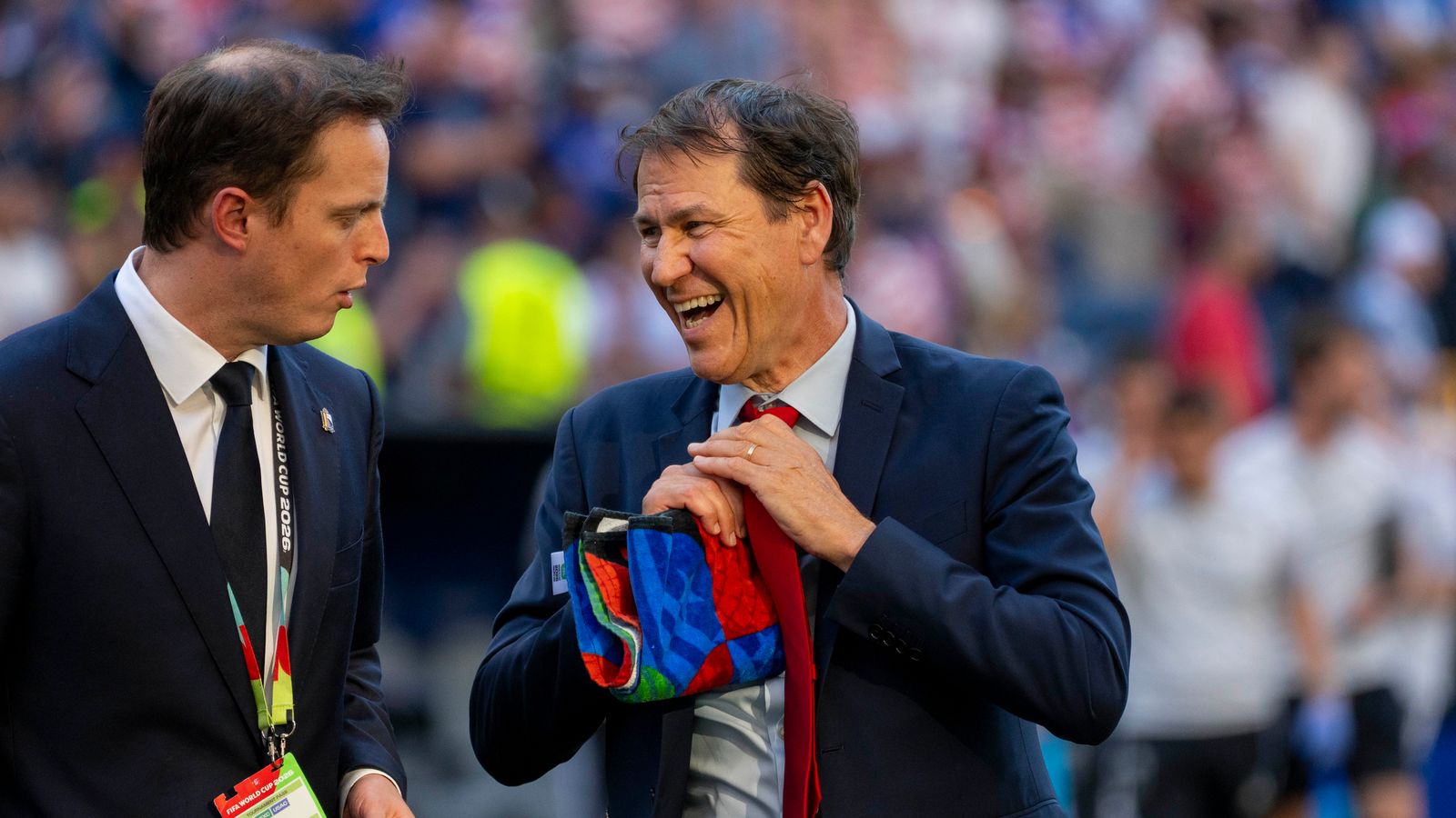 Belgium coach Rudi Garcia heads to the locker room post-match.