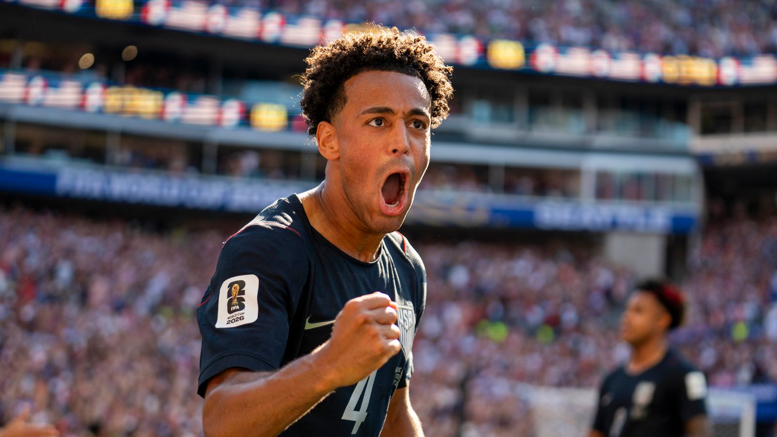 Tyler Adams celebrates a goal in the World Cup match against Belgium.