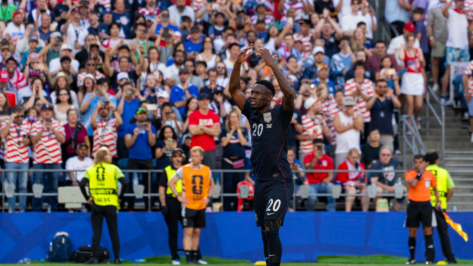 Folarin Balogun energizes the crowd in the World Cup match against Belgium.