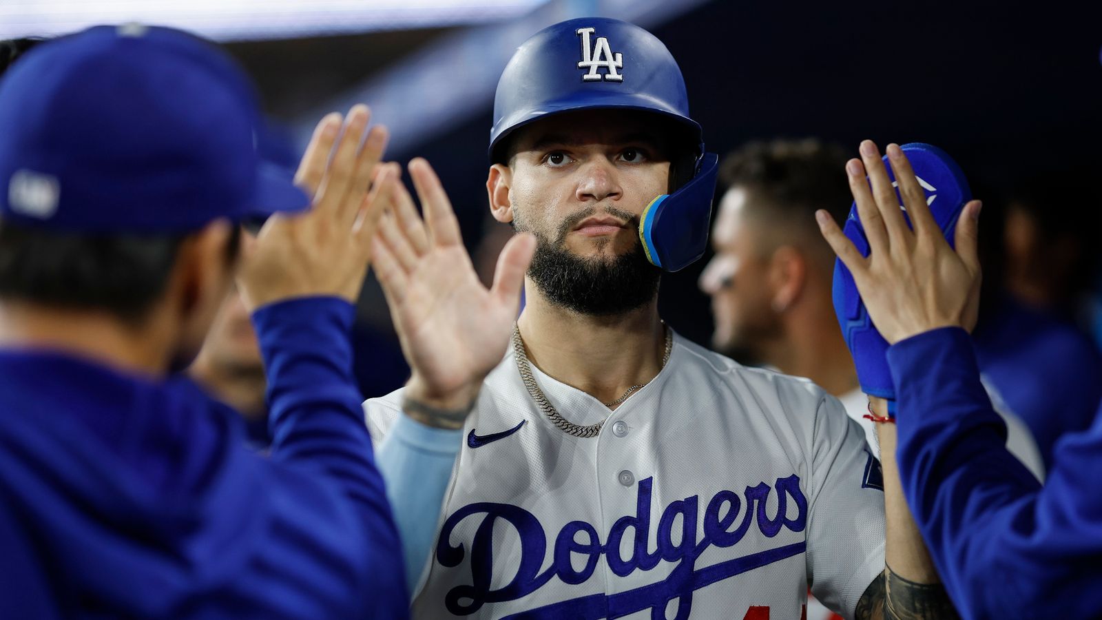 Andy Pages celebrates with Dodgers in the dugout