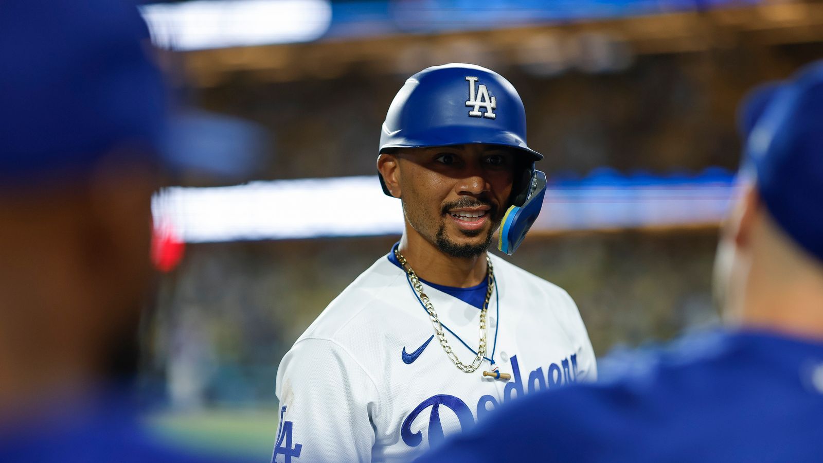 Mookie Betts strategizing with Dodgers teammates