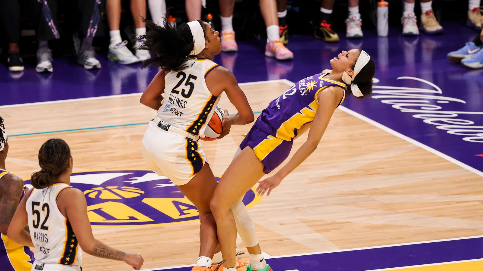 Rae Burrell draws a charge on Monique Billings in WNBA game
