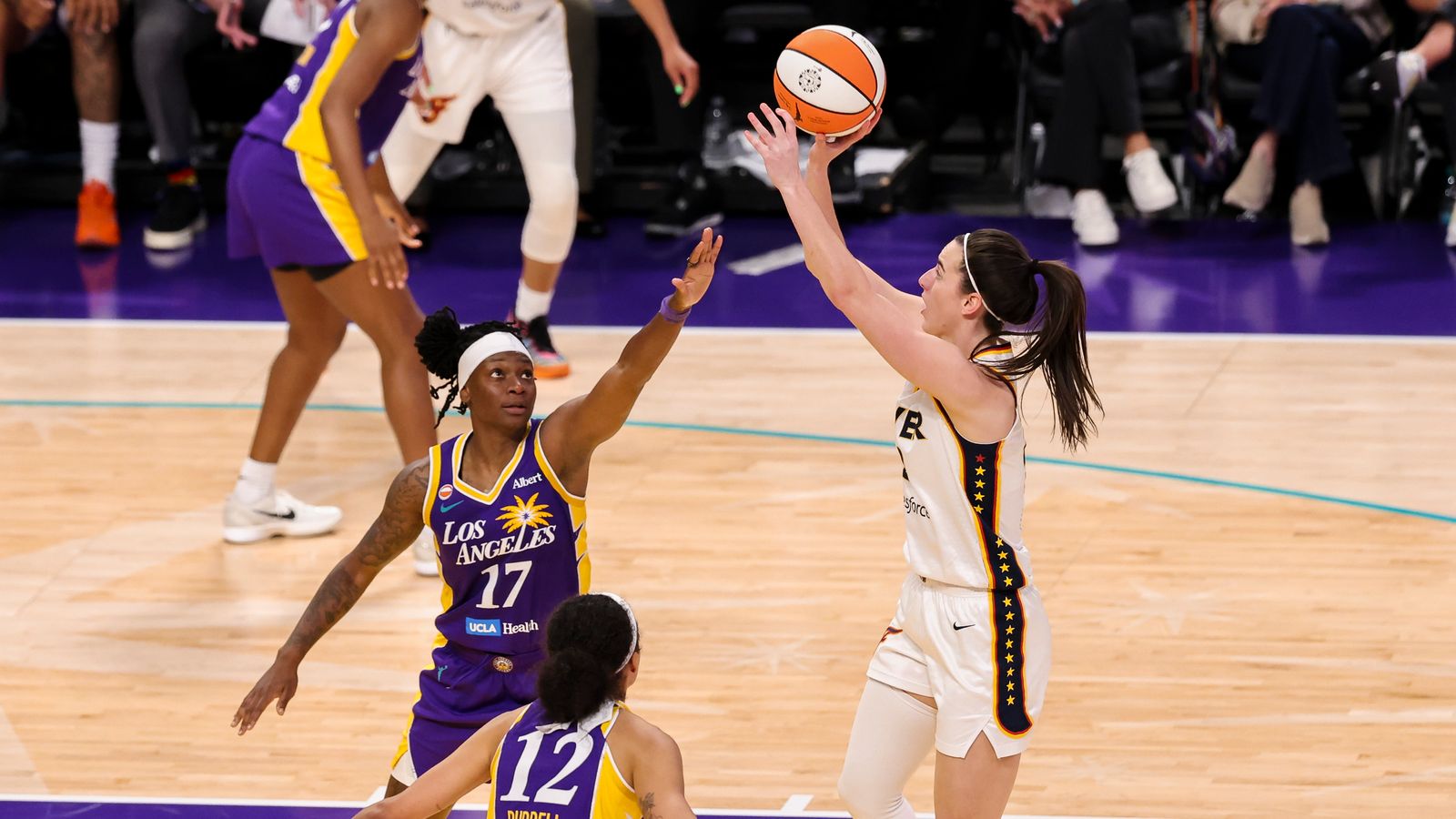 Caitlin Clark shoots during a WNBA game in Los Angeles