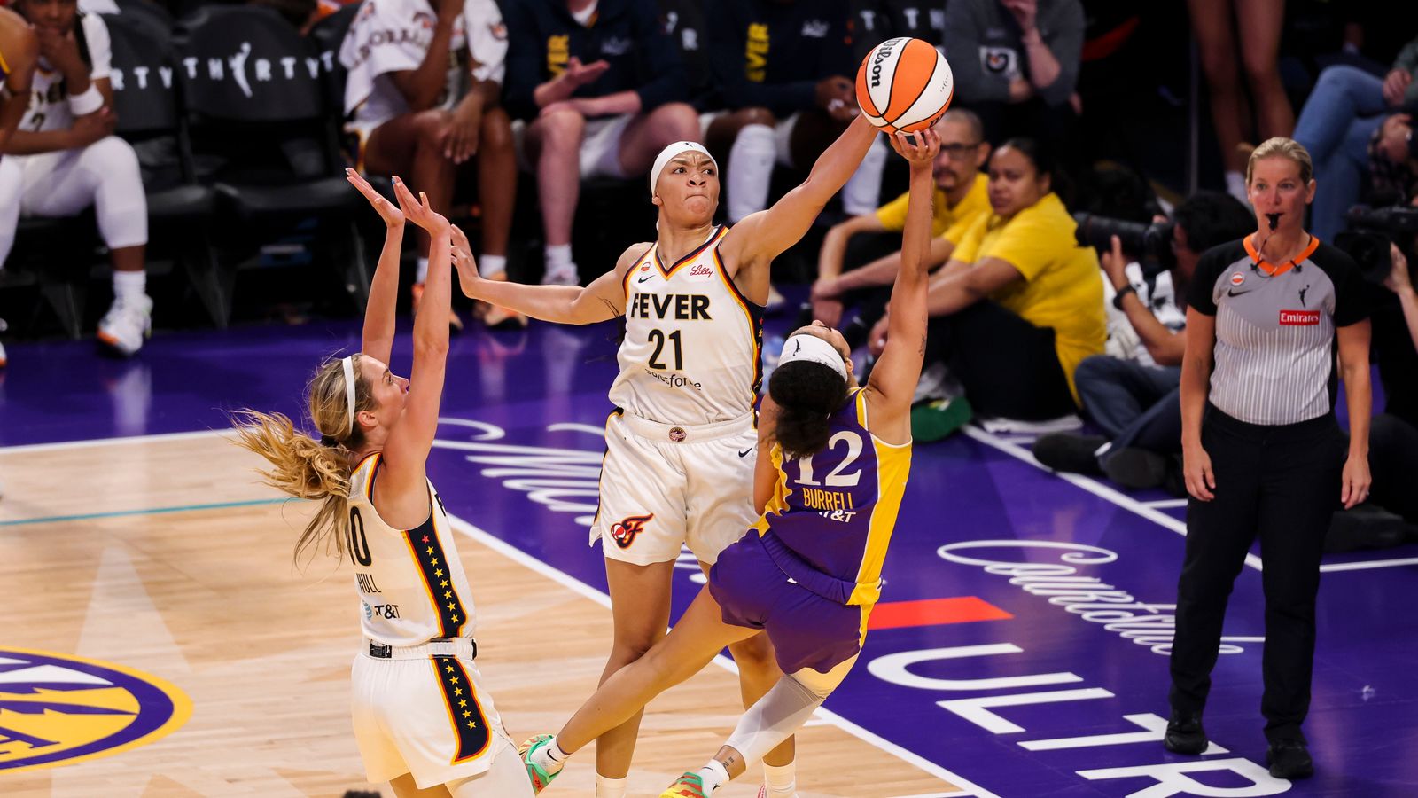 Makayla Timpson blocks Rae Burrell's shot in WNBA game