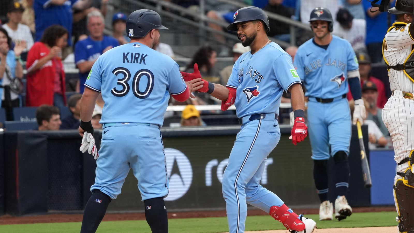 Clase and Kirk celebrate after a home run at Petco Park