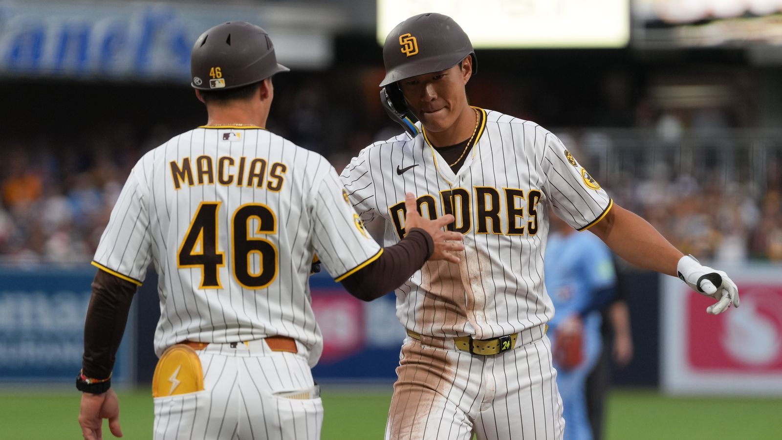 Sung-Mun Song celebrates a hit in game against Blue Jays