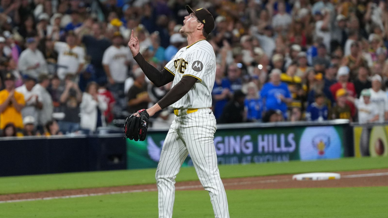 Mason Miller celebrates a strikeout against Blue Jays