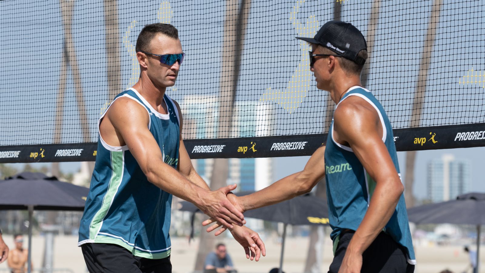 Lotman and Partain celebrate a point at AVP Long Beach