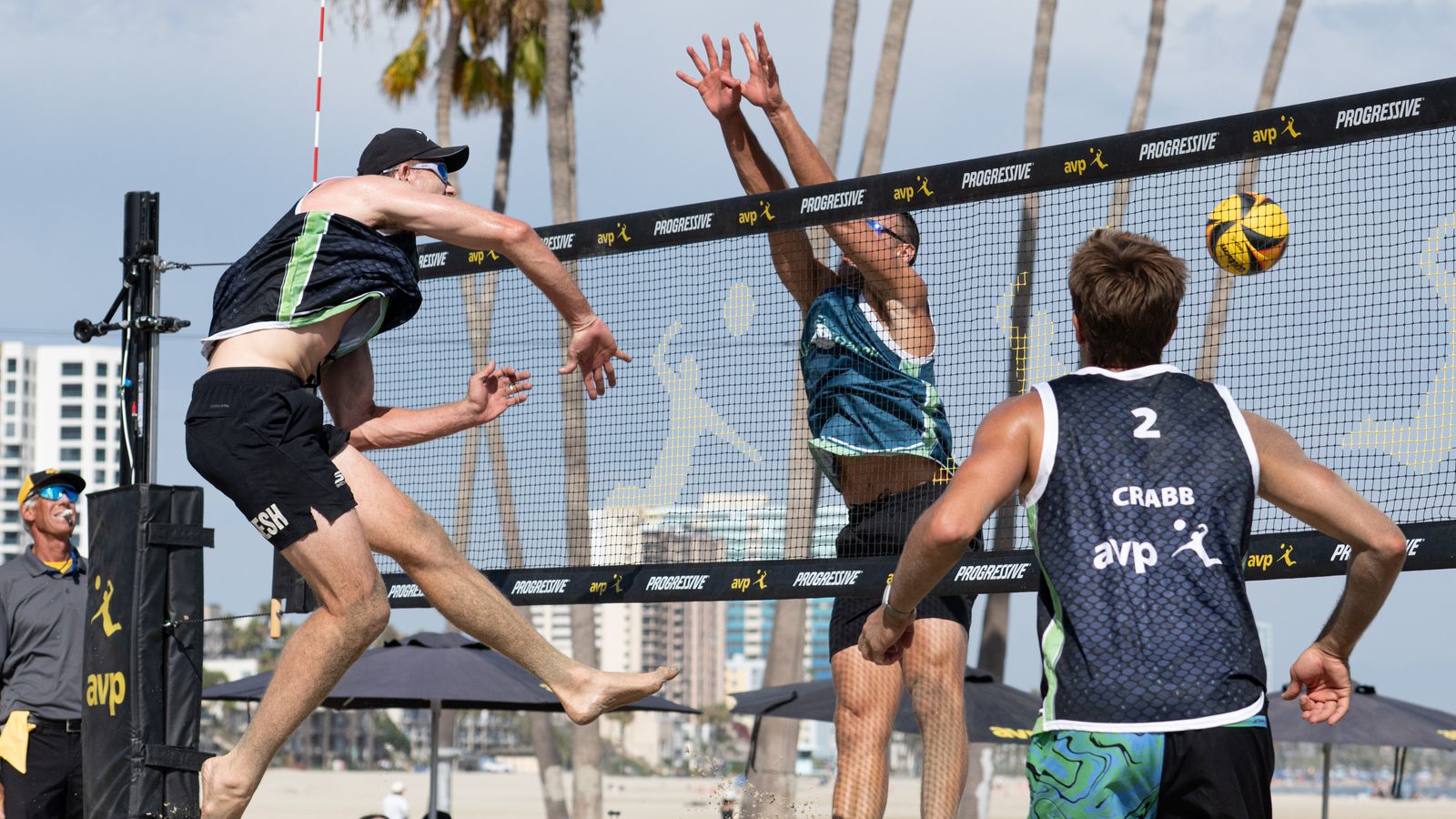 Andy Benesh spikes the ball at AVP Long Beach 2026