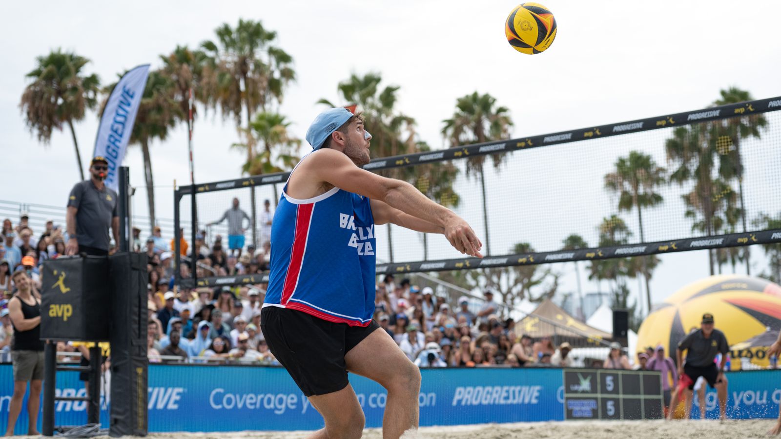 Evan Cory runs to keep the ball in play at AVP Long Beach