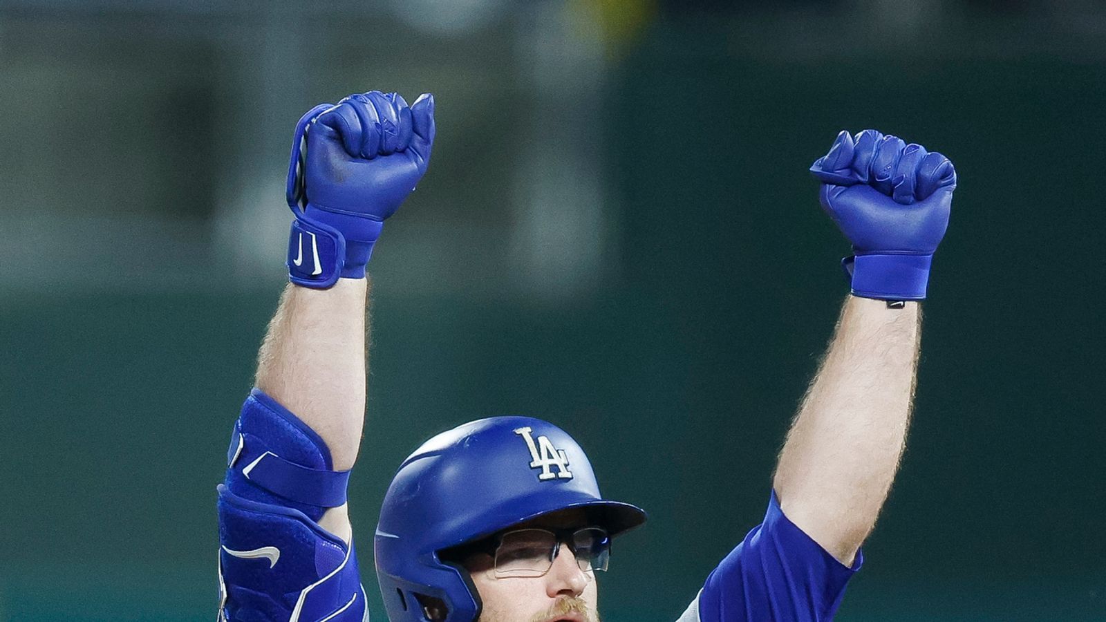 Max Muncy celebrates at second base, Phillies vs Dodgers