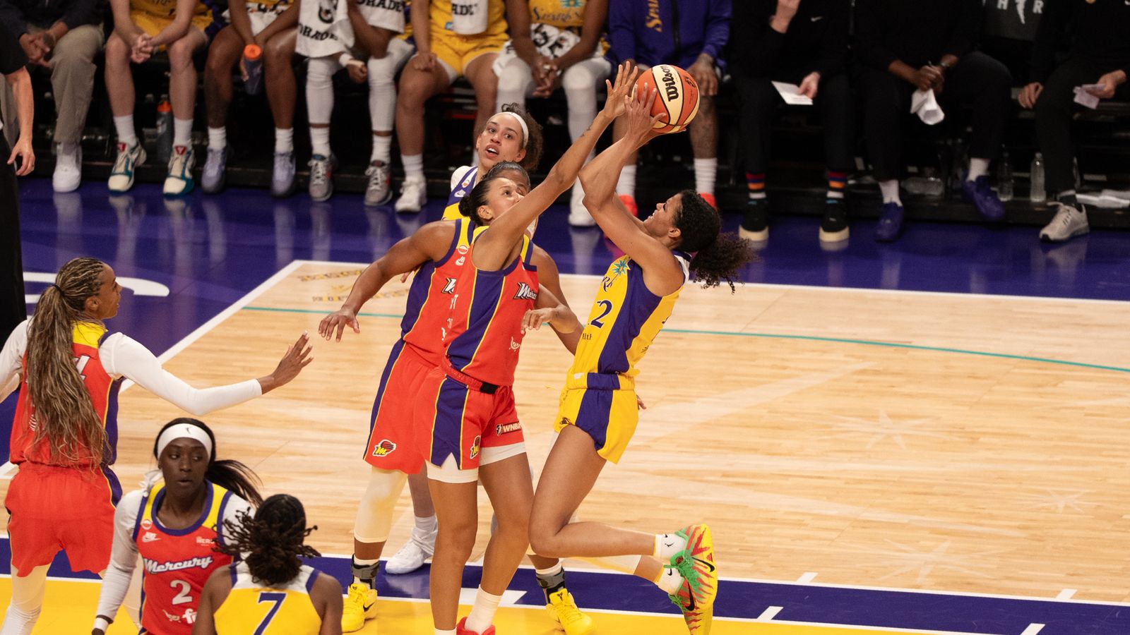 Rae Burrell scores on a fast break vs. Mercury