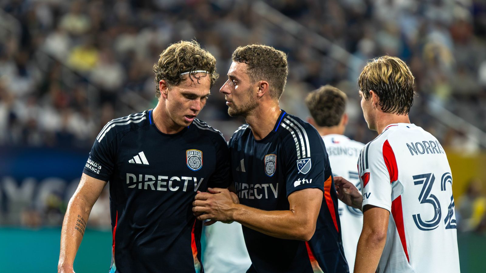 Onni Valakari and Christopher McVey strategize before a corner kick.