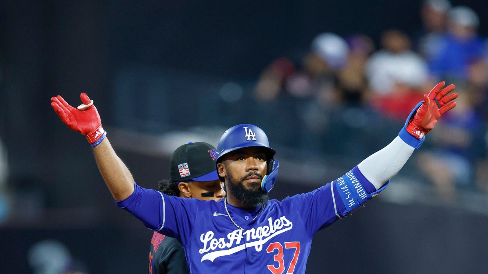 Teoscar Hernandez celebrates at second base, July 25, 2026