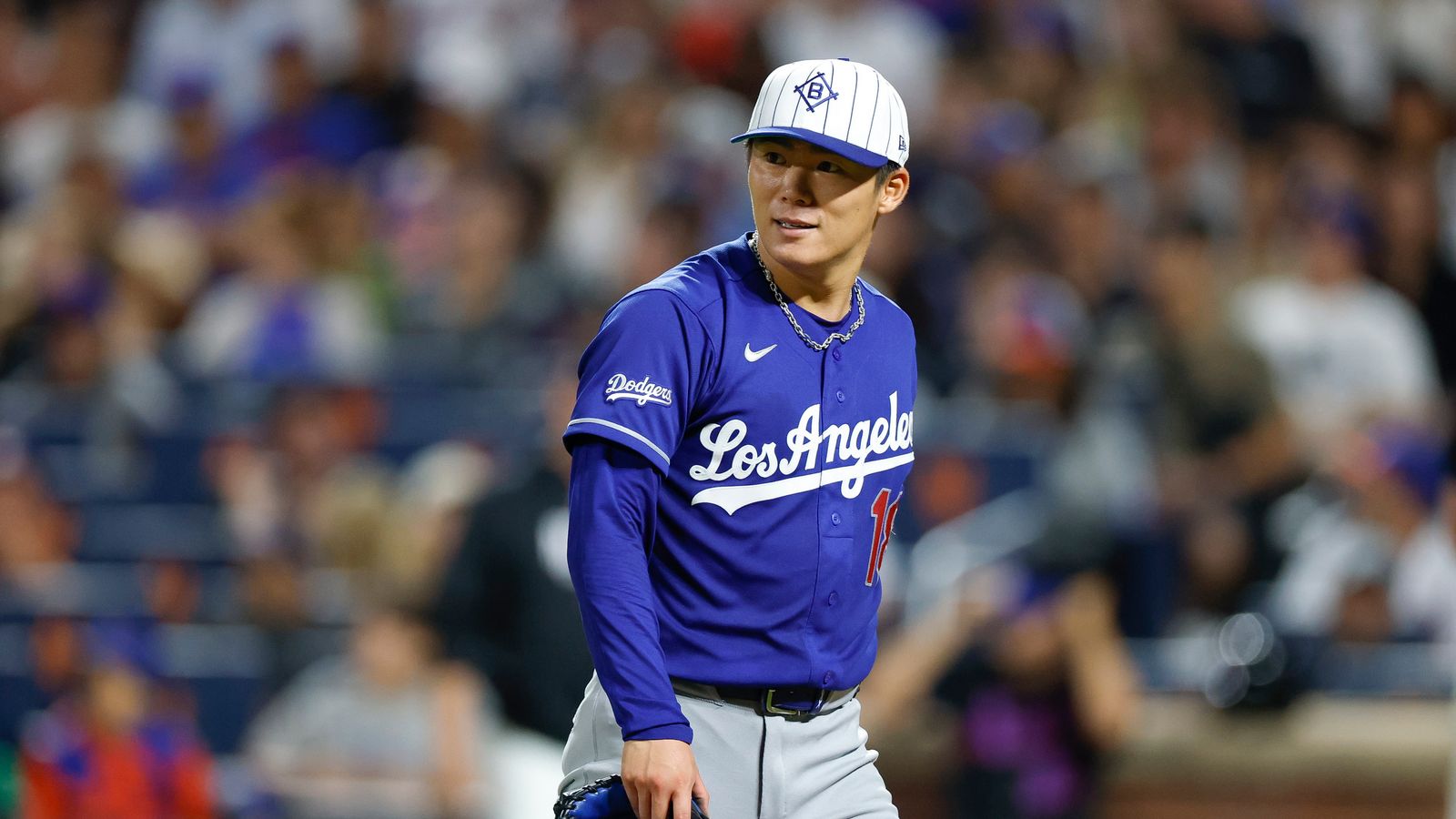 Yoshinobu Yamamoto smiles on the field, July 25, 2026