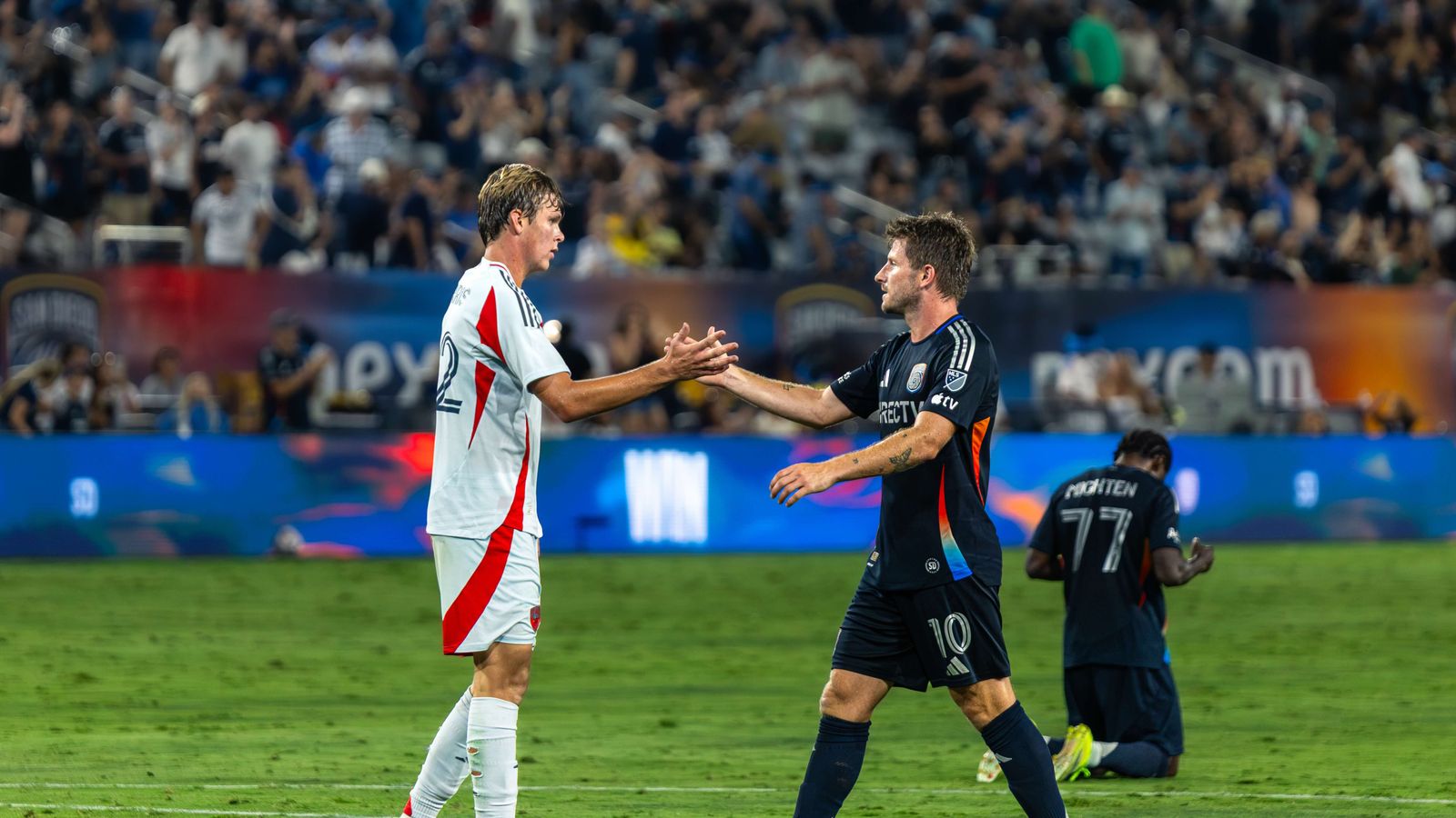 Anders Dreyer and Nolan Norris share a handshake post-match.