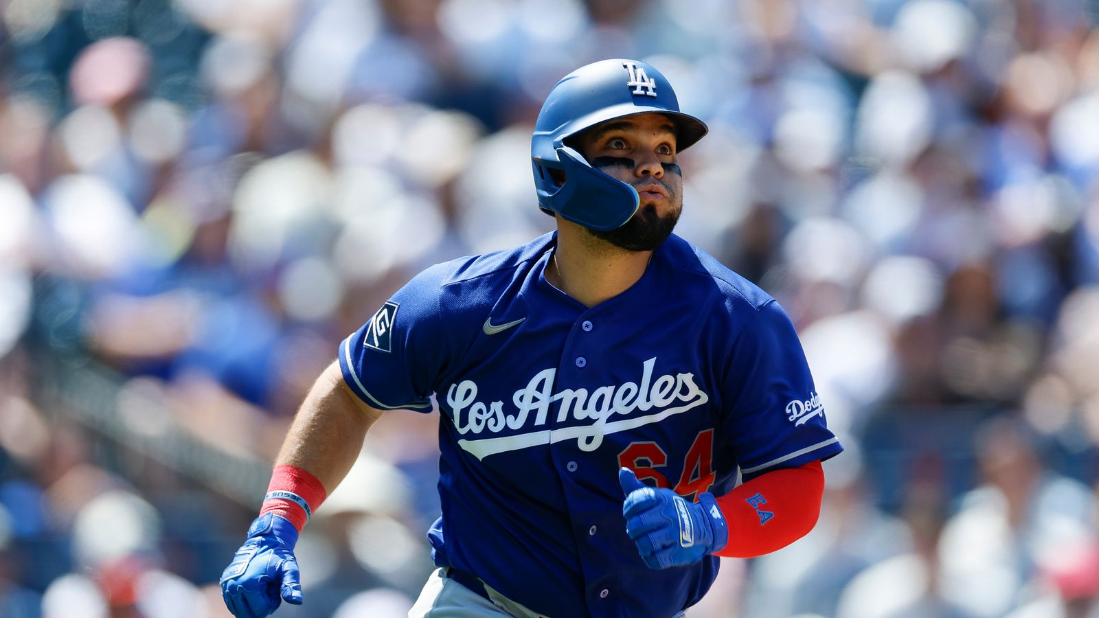 Eliezer Alfonzo runs up the line against the Mets.