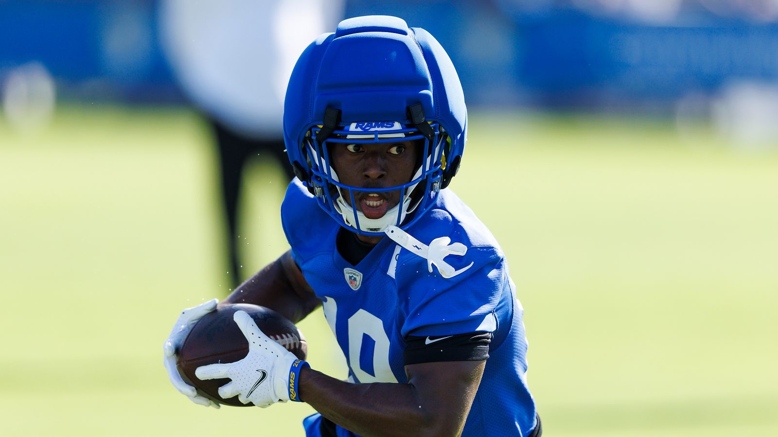 Xavier Smith #19 runs after catch at Rams Training Camp