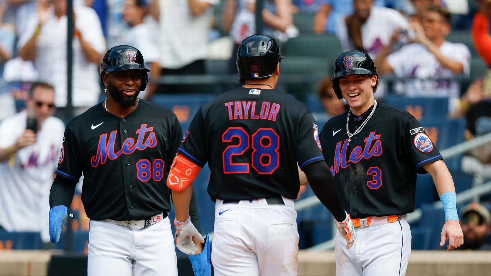 Tyrone Taylor celebrates his home run at Citi Field.