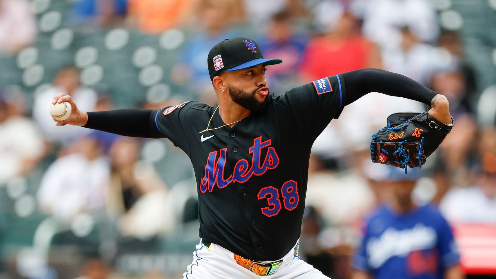 Devin Williams pitches against the Dodgers.