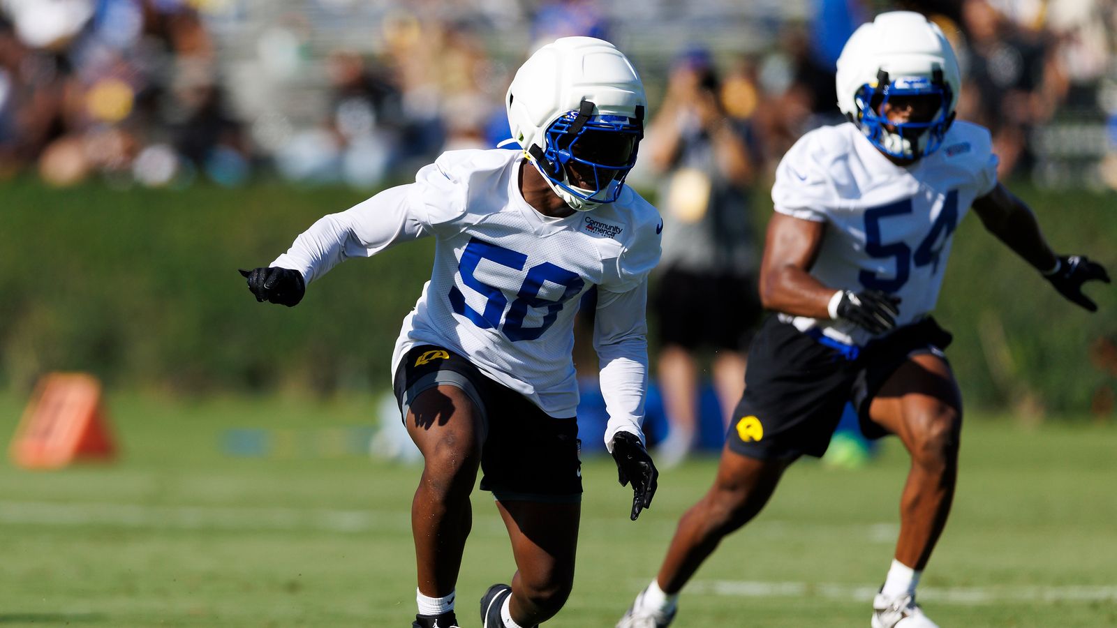 Elias Neal #58 defends during Rams Training Camp