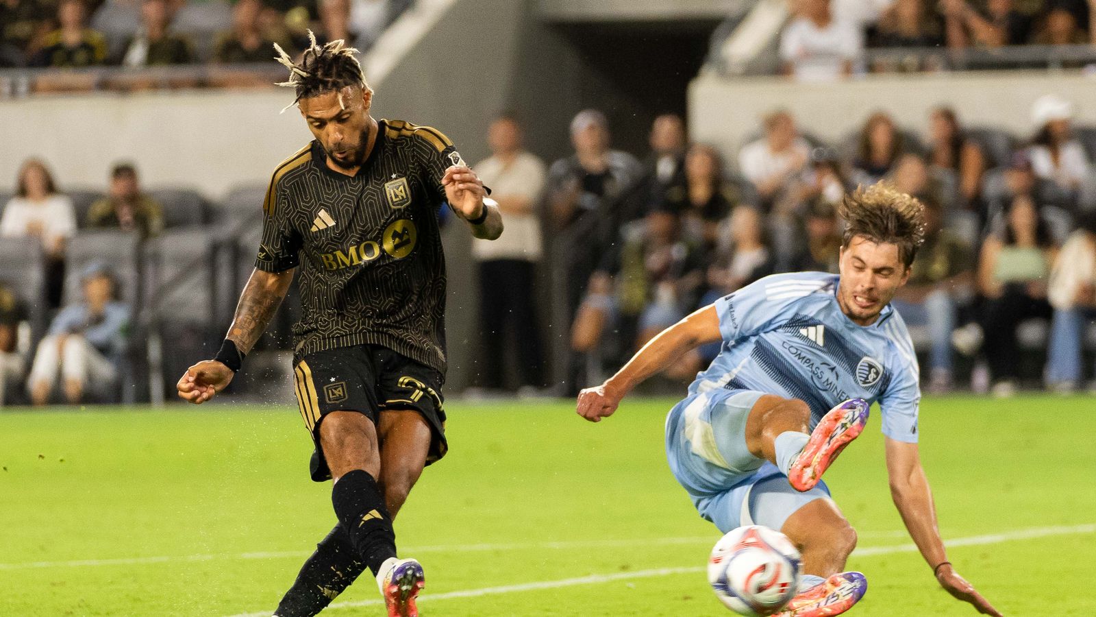 Denis Bouanga scores during the LAFC vs KC Sporting game
