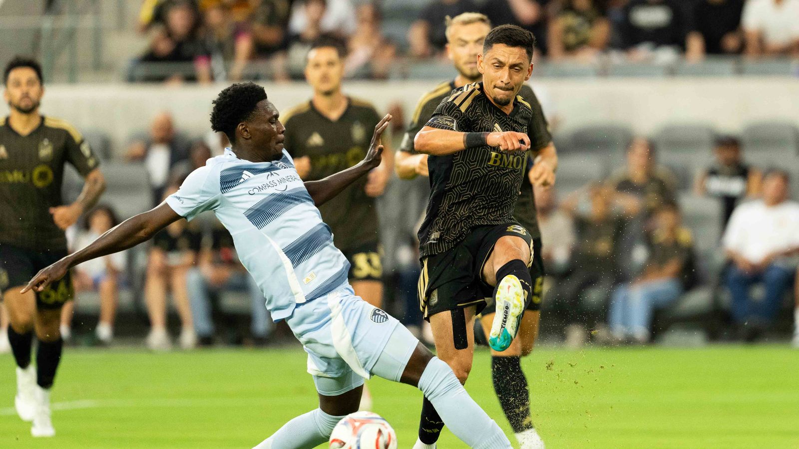 Mark Delgado passes the ball in match against KC Sporting