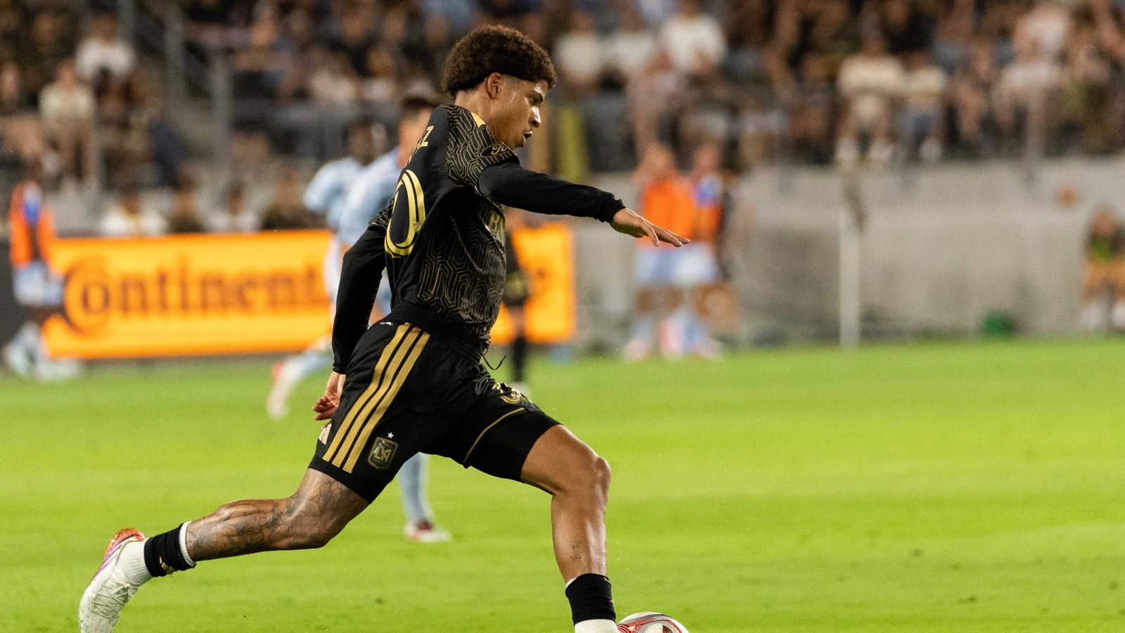 David Martinez charges forward in the game against KC Sporting