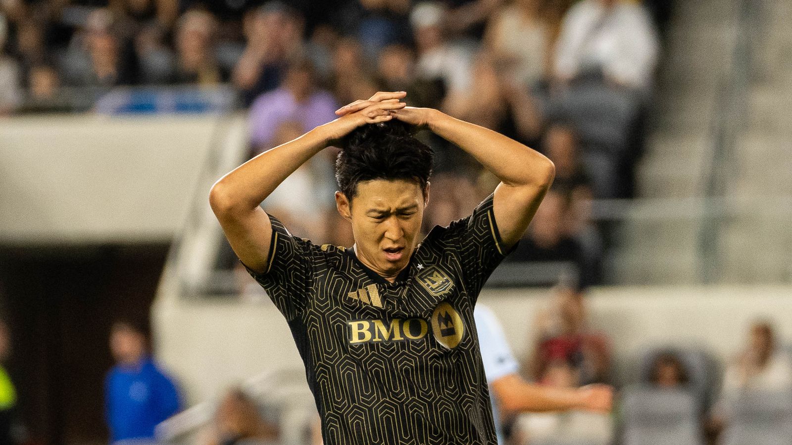 Heung-Min Son reacts to a missed opportunity against KC Sporting