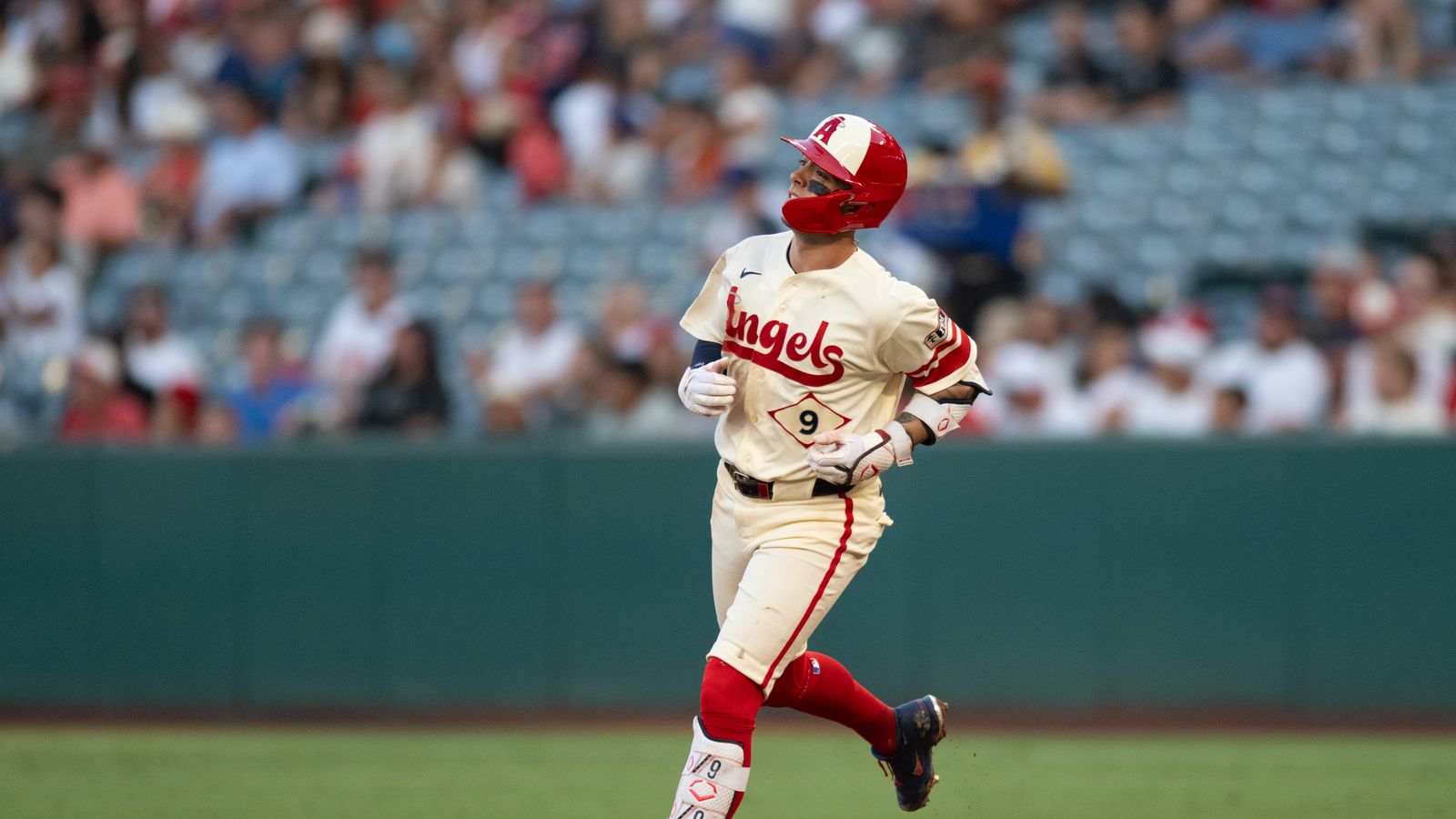 Zach Neto hustles to second base against the Astros