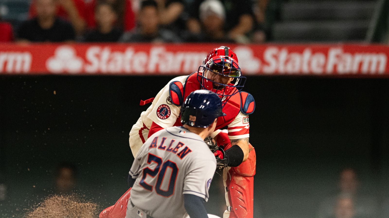 Nick Allen gets tagged out at home in a crucial play