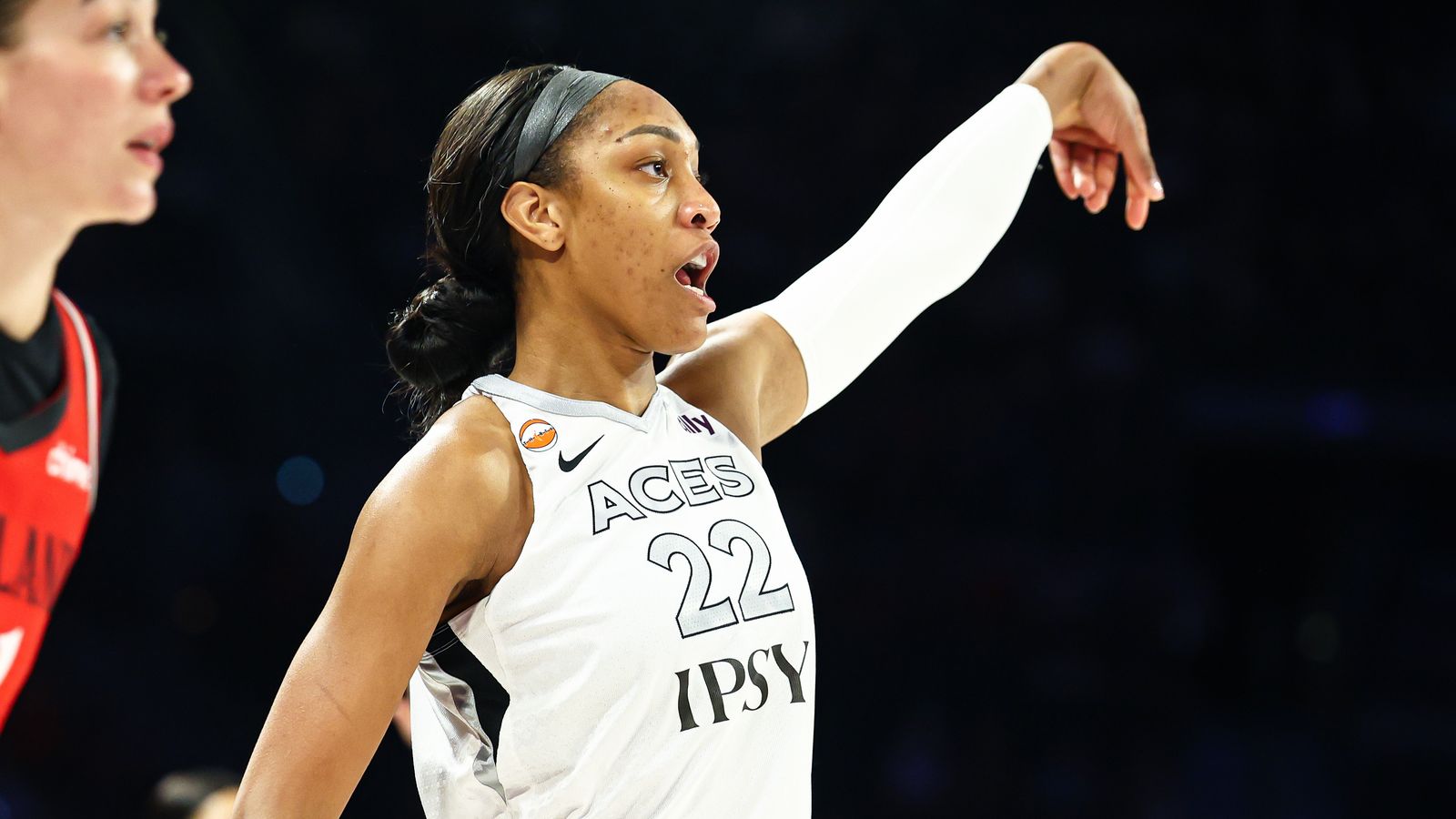 A'ja Wilson nails a three-pointer for the Aces against the Fire