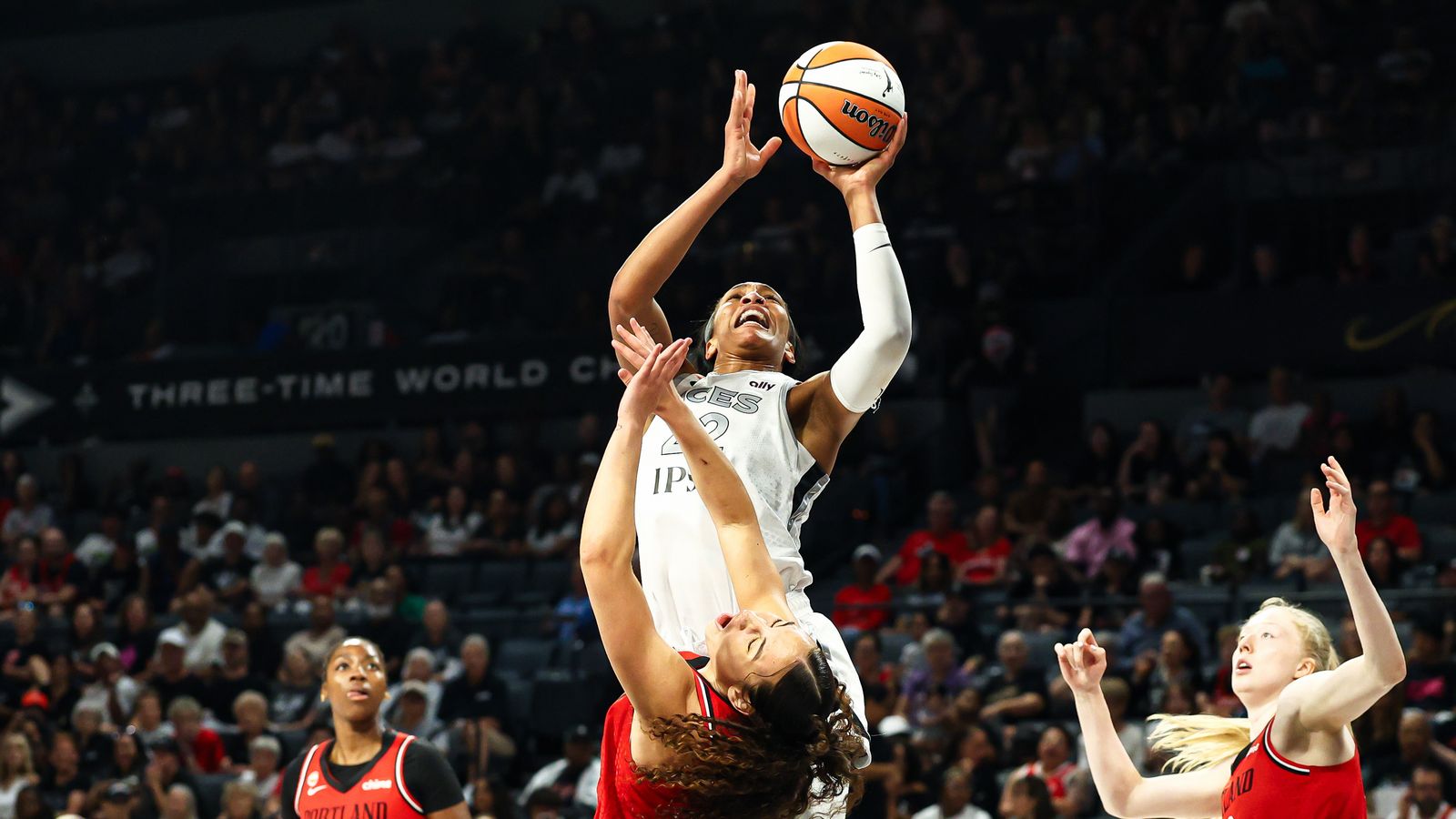A'ja Wilson attempts a lay-up under pressure