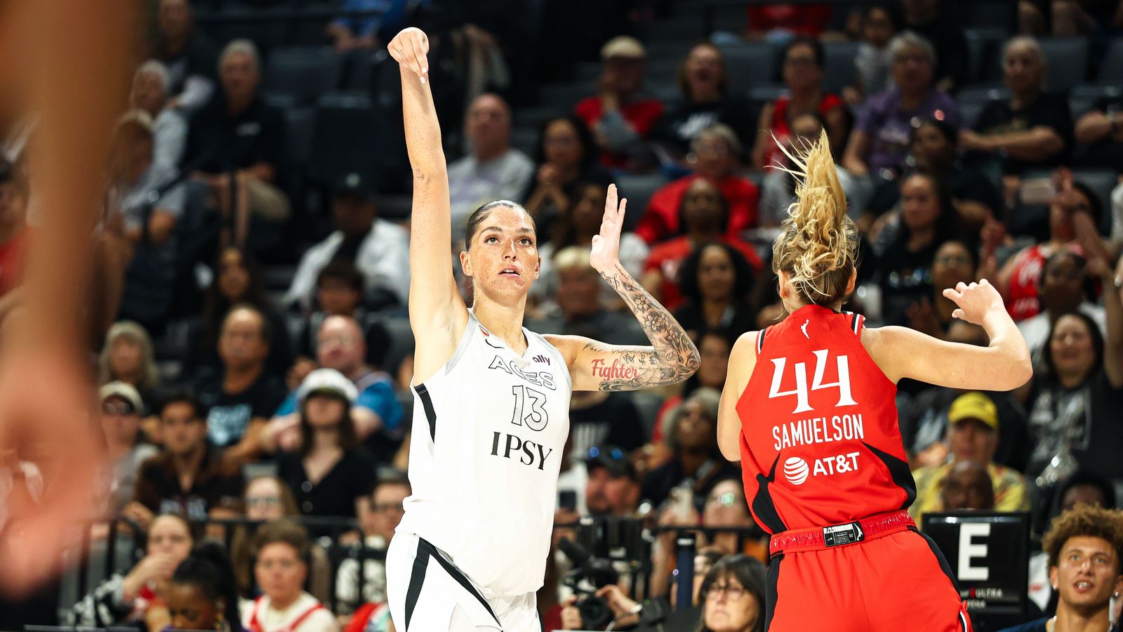 Justine Pissott scores from downtown in WNBA action