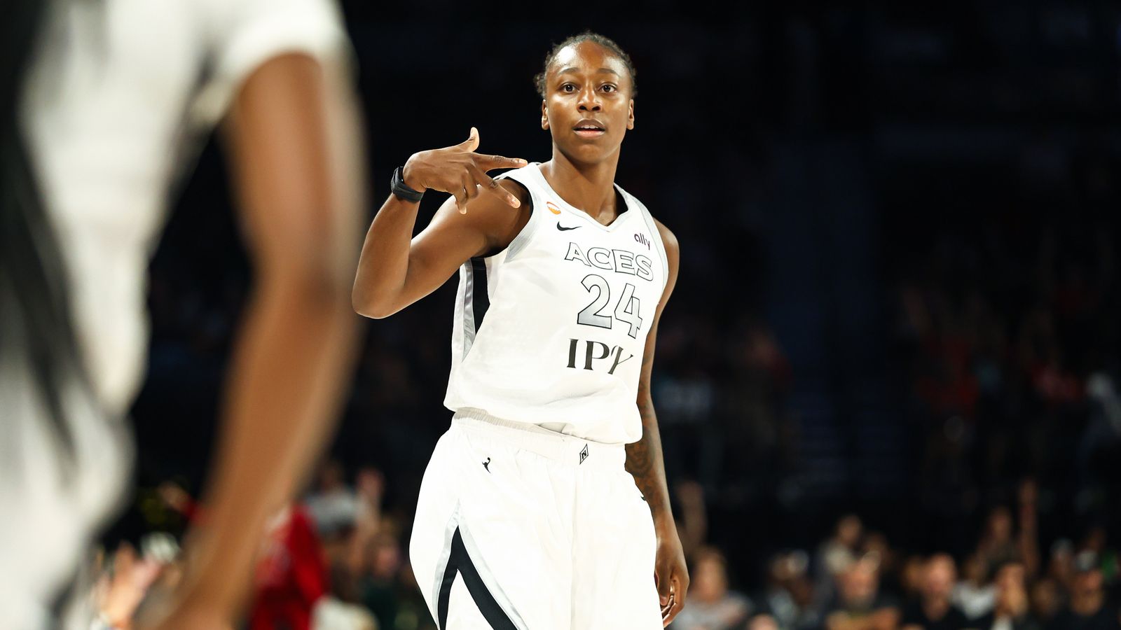 Jewell Loyd celebrates a three-point shot versus the Fire