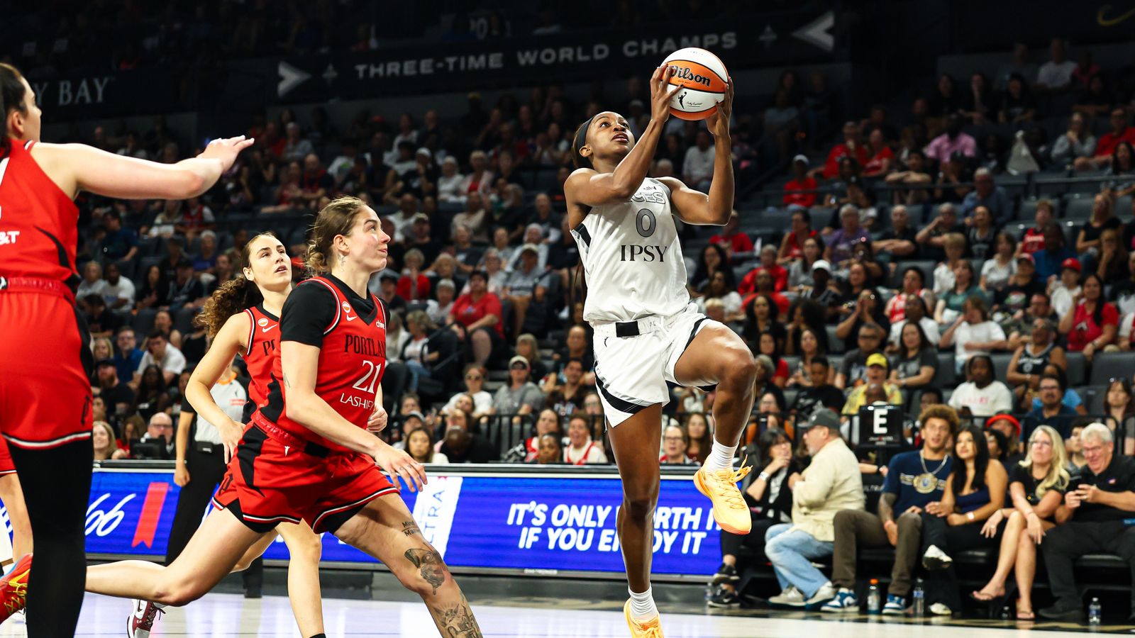 Jackie Young scores an easy lay-up against the Fire