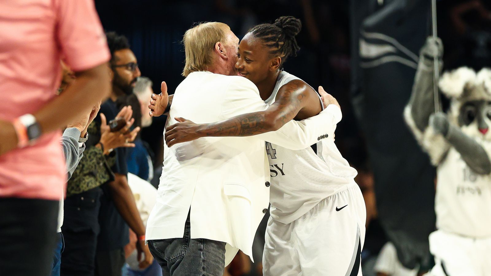 Jewell Loyd and Mark Davis celebrate Aces' victory