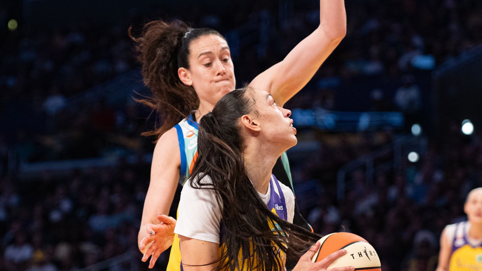 Dearica Hamby maneuvers under the rim against NY Liberty
