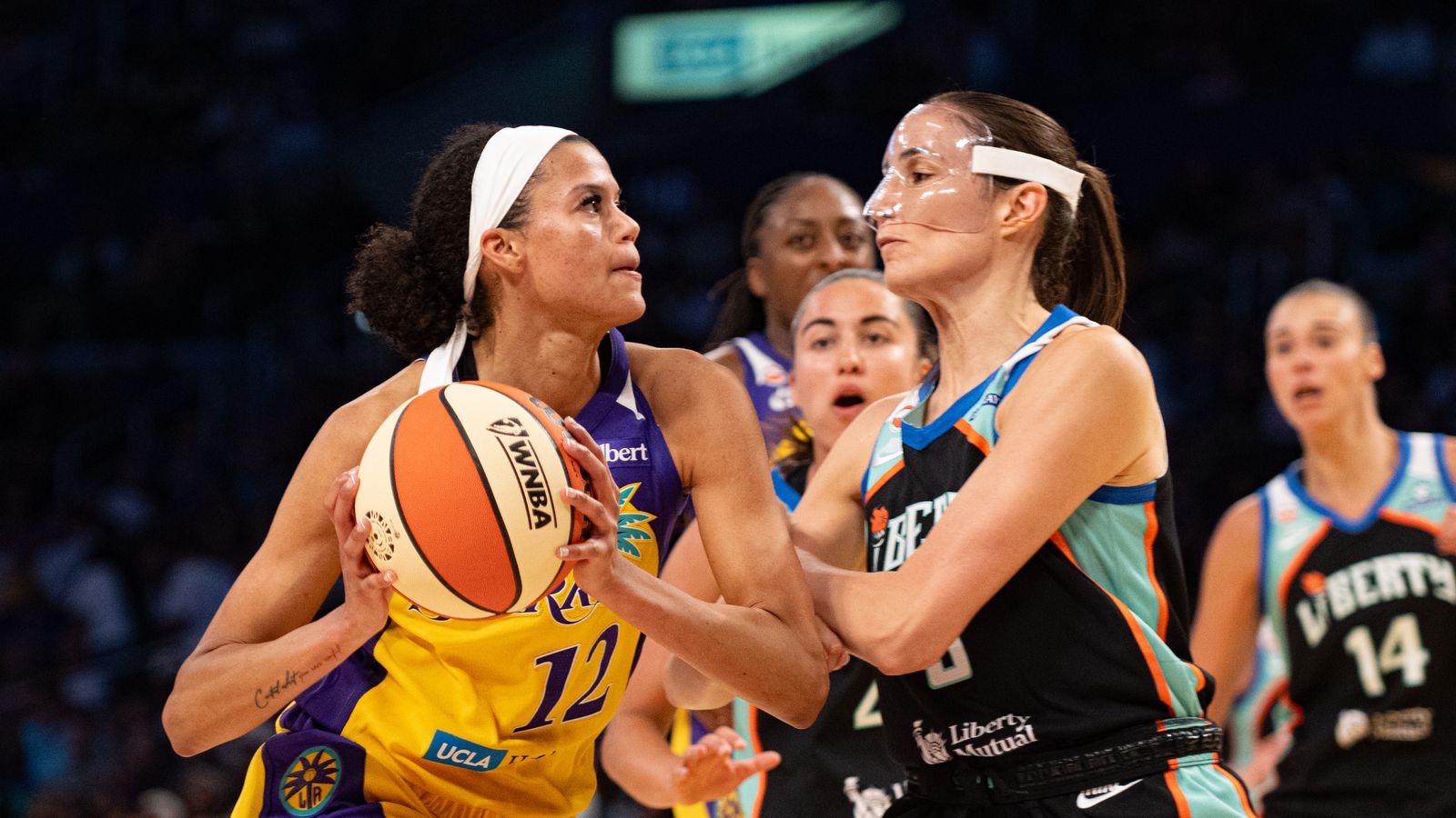 Rae Burrell's aggressive drive to the basket in WNBA action