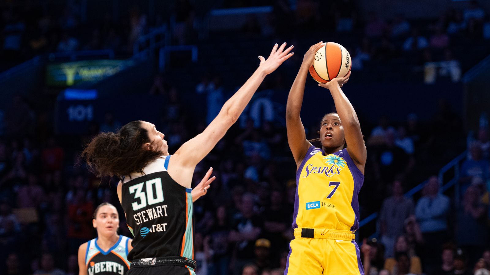 Ariel Atkins takes a jump shot in a WNBA showdown