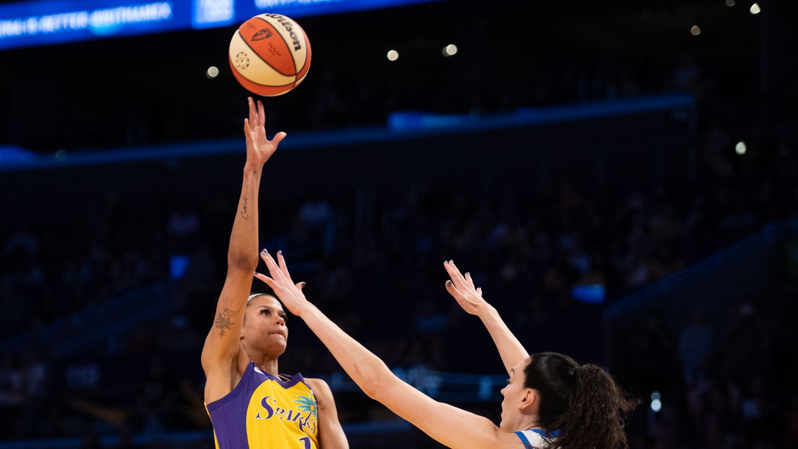 Rae Burrell executes a hook shot against NY Liberty