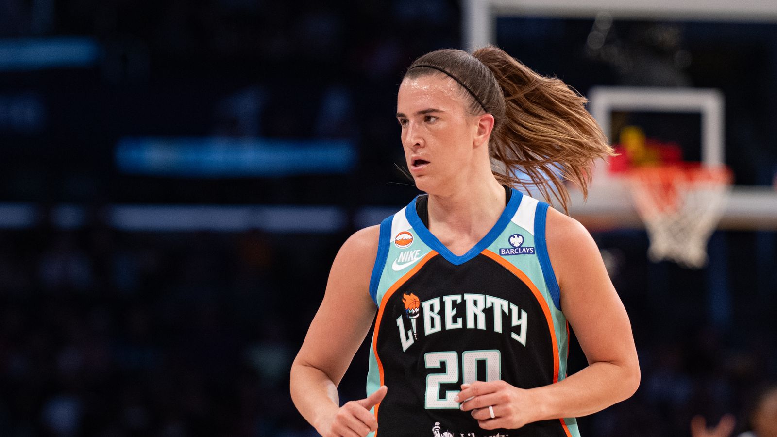 Sabrina Ionescu runs back on defense after a three-pointer