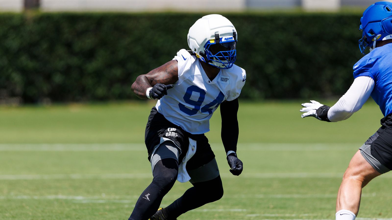 Desjuan Johnson #94 Rushes the Edge at Rams Camp