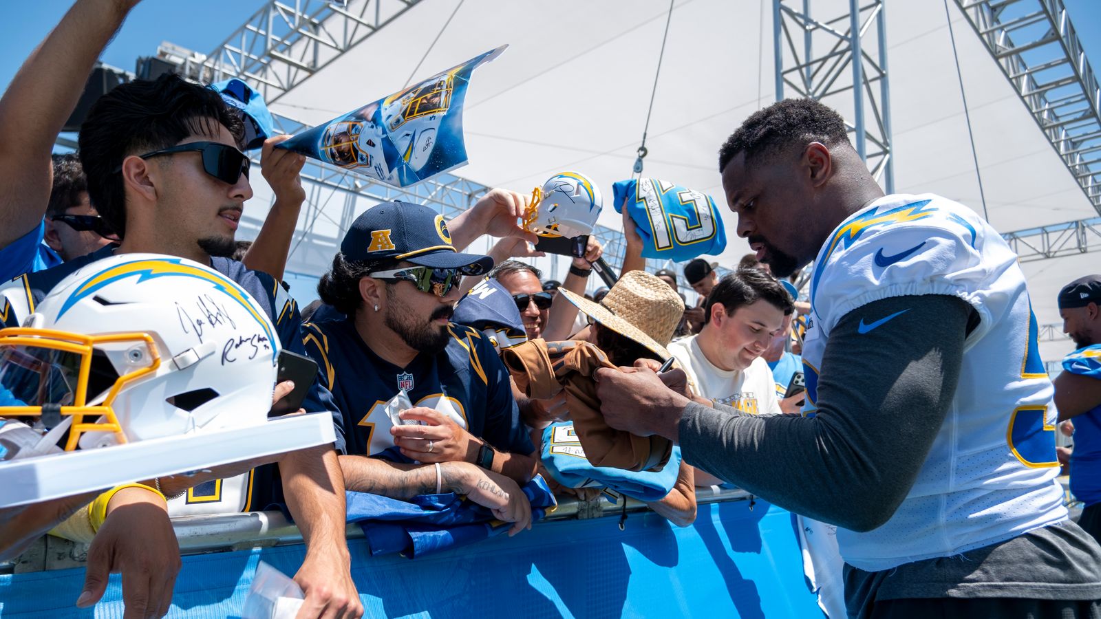 Khalil Mack Signing Merchandise at Chargers Camp