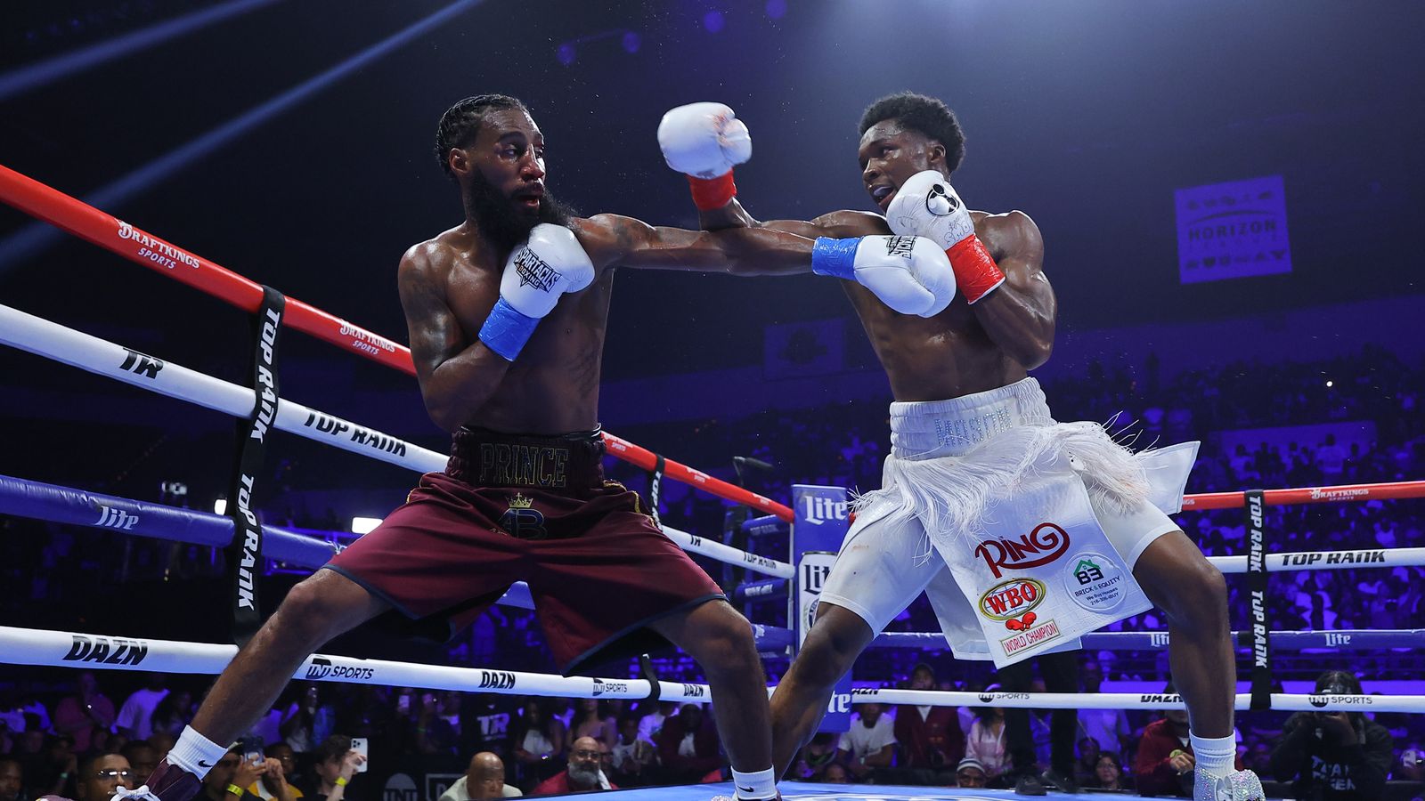 Abdullah Mason and Albert Bell exchange in close quarters as the fight swings in Mason's favor.