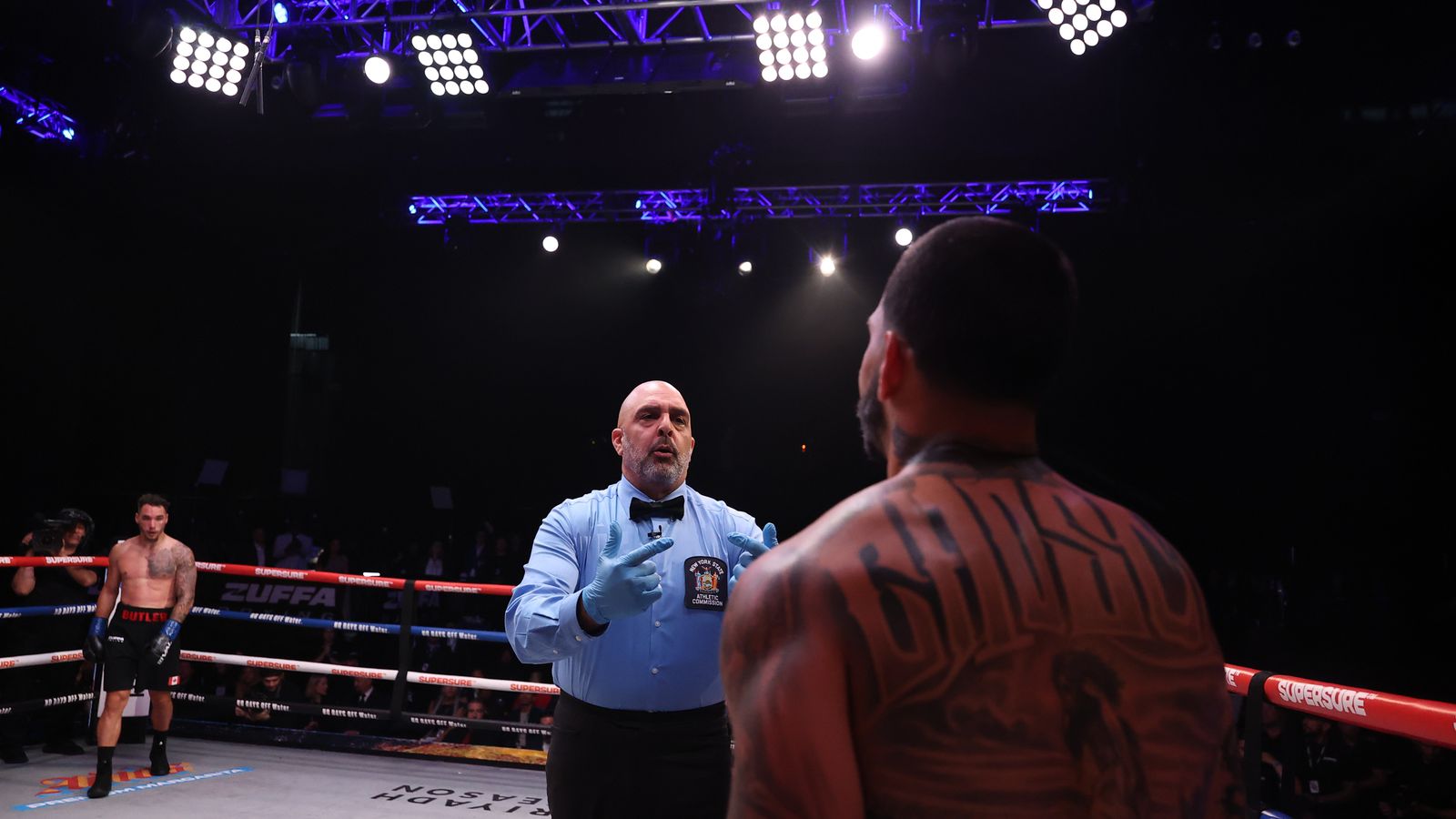Referee counts as Edgar Berlanga recovers from a knockdown