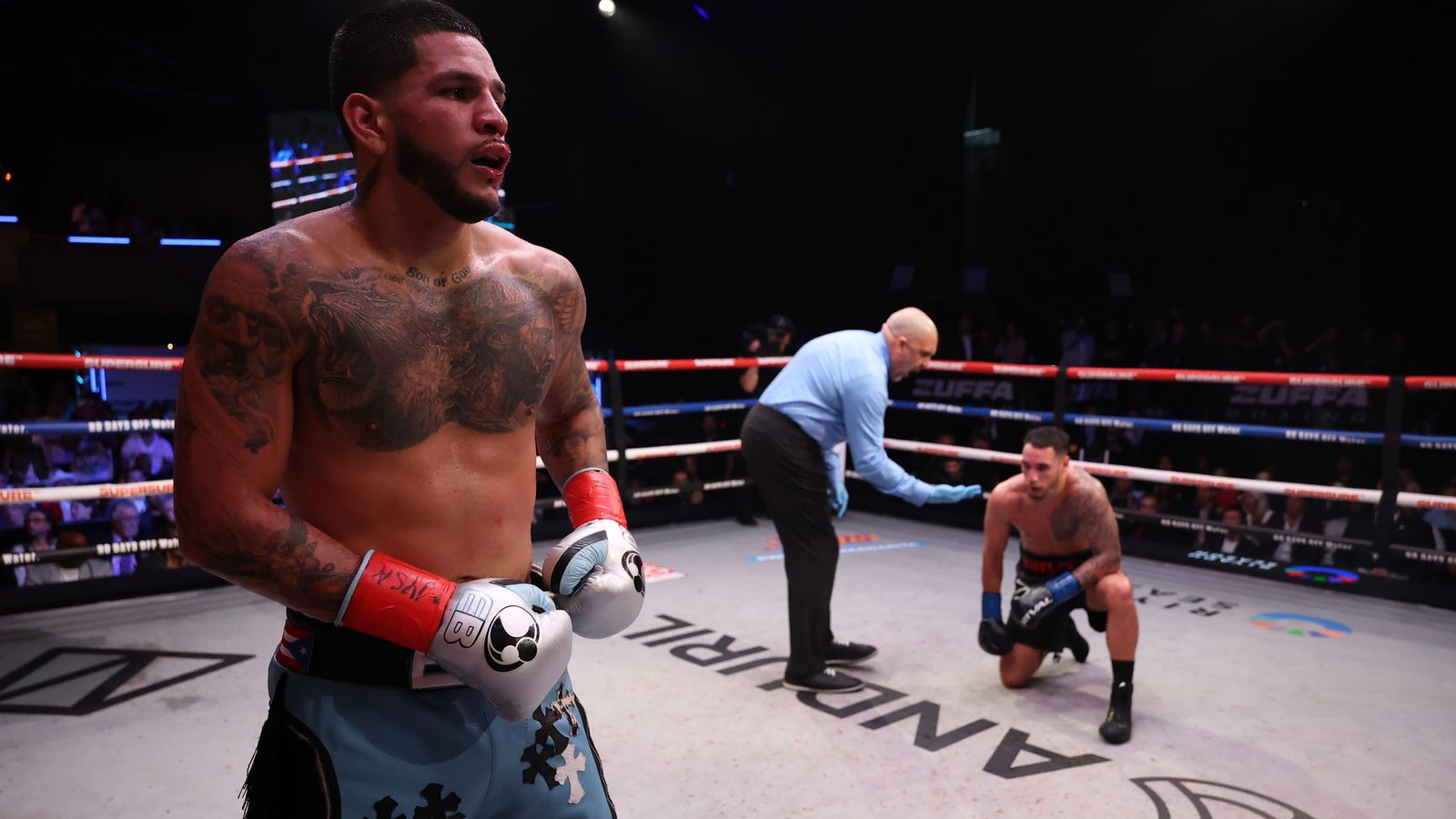 Steven Butler receives an 8 count after being knocked down by Berlanga